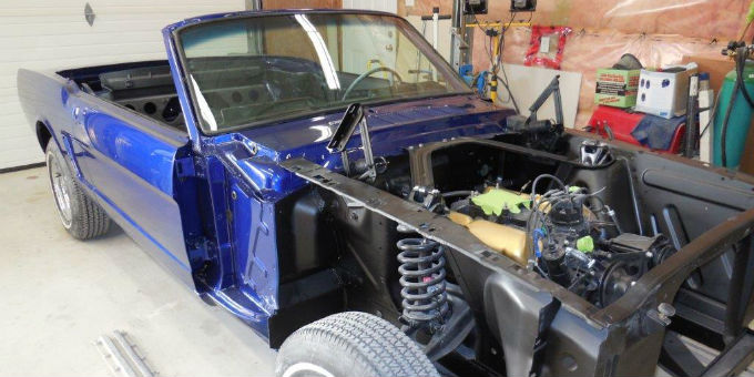 Putting in the Motor of the 1965 Ford Mustang